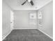 Cozy bedroom featuring a window, neutral walls, and carpeted floors at 9665 Gull Lake Dr, Indianapolis, IN 46239