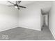 Bright bedroom with a ceiling fan overlooking the upstairs hallway at 9665 Gull Lake Dr, Indianapolis, IN 46239