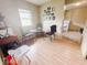 Bright dining area with hardwood floors, modern table and chairs, view to the kitchen at 1002 S Fleming St, Indianapolis, IN 46241