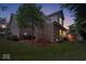 Brick home featuring a lush green lawn and mature landscaping, offering great curb appeal at 10381 Beaver Ridge Dr, Fishers, IN 46037