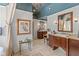 Elegant bathroom featuring double vanities, granite counters, and a bathtub behind a partition at 10594 Geist Rd, Fishers, IN 46037