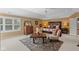 Spacious bedroom featuring a bed, seating, and a stylish rug and furniture at 10594 Geist Rd, Fishers, IN 46037