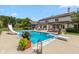This in-ground pool area boasts a diving board and a slide, perfect for summer fun! at 10594 Geist Rd, Fishers, IN 46037