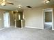 Upstairs hallway area featuring carpet and ceiling fan with views into other rooms at 11154 Schoolhouse Rd, Fishers, IN 46037