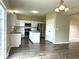 Open-concept kitchen features a center island, stainless steel appliances, and eat-in breakfast area at 11154 Schoolhouse Rd, Fishers, IN 46037