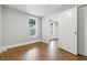 A bedroom with hardwood floors and a window at 1151 S Randolph St, Indianapolis, IN 46203