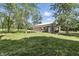 Barn with large sliding door, surrounded by well-maintained lawn at 1346 N Buck Creek Rd, Greenfield, IN 46140