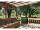 Cozy pergola overlooking the backyard at 1346 N Buck Creek Rd, Greenfield, IN 46140