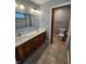 Bathroom features a double sink vanity with plenty of storage and updated fixtures at 1633 Belfield St, Indianapolis, IN 46217