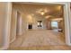 Spacious living room featuring a fireplace, neutral carpet, and ample natural light at 1633 Belfield St, Indianapolis, IN 46217