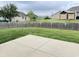 Spacious backyard with a well-kept lawn, a fenced perimeter, and a patio at 1706 Creekwater Pass, Greenfield, IN 46140