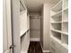 Long and narrow walk-in closet with generous shelving and ample storage space at 1706 Creekwater Pass, Greenfield, IN 46140