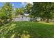 Spacious backyard with lush lawn, offering ample space for outdoor activities at 1809 Mutz Dr, Indianapolis, IN 46229