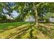 Spacious backyard with lush lawn, offering ample space for outdoor activities at 1809 Mutz Dr, Indianapolis, IN 46229