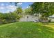 Spacious backyard with lush lawn, offering ample space for outdoor activities at 1809 Mutz Dr, Indianapolis, IN 46229