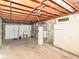 Unfinished basement featuring exposed ductwork, concrete walls, and a utility sink at 18378 Southeastern Pkwy, Fortville, IN 46040