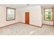 Bedroom featuring windows and carpeted floor at 18378 Southeastern Pkwy, Fortville, IN 46040