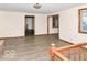 Bright living room with hardwood floors and staircase at 18378 Southeastern Pkwy, Fortville, IN 46040