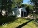 Detached outbuilding with garage doors, perfect for storage or a workshop at 18378 Southeastern Pkwy, Fortville, IN 46040