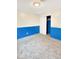 Bright bedroom featuring two-tone walls and neutral carpet at 205 Eikenberry St, Greenfield, IN 46140