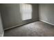 Cozy bedroom with neutral carpet and walls at 2083 Kerns Ct, Carmel, IN 46280