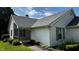 Charming house with a covered porch and well-manicured landscaping, offering a cozy and inviting entry at 2083 Kerns Ct, Carmel, IN 46280