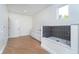 Bright utility room features a convenient dog shower, built-in cabinets, and hardwood floors at 2130 Brookside Pkwy N Dr, Indianapolis, IN 46201