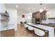 Elegant kitchen with a marble island, stainless appliances, and hardwood flooring at 2130 Brookside Pkwy N Dr, Indianapolis, IN 46201