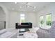 Modern living room filled with natural light, featuring a stylish sofa and comfortable seating at 2130 Brookside Pkwy N Dr, Indianapolis, IN 46201
