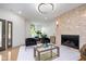 Bright, modern living room with fireplace and comfortable seating at 2130 Brookside Pkwy N Dr, Indianapolis, IN 46201
