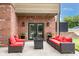 Relax on the patio with stylish furniture and a cozy fire pit at 2130 Brookside Pkwy N Dr, Indianapolis, IN 46201