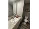 Cozy bathroom featuring a single sink with granite countertop and a decorative tile backsplash at 2239 Chevelle Ct, Anderson, IN 46012