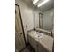 This bathroom features a sink, vanity, large mirror, and tile backsplash at 2239 Chevelle Ct, Anderson, IN 46012