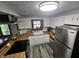 Kitchen featuring butcher block countertops, white cabinetry and stainless steel appliances for a clean and modern aesthetic at 2239 Chevelle Ct, Anderson, IN 46012