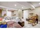 Partially finished basement featuring seating, storage, and potential for customization at 2359 Seattle Slew Dr, Indianapolis, IN 46234