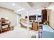 Finished basement with cozy seating area, entertainment setup, and ample storage at 2359 Seattle Slew Dr, Indianapolis, IN 46234
