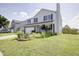 Attractive home showcasing a well-manicured lawn and inviting curb appeal with mature landscaping at 2359 Seattle Slew Dr, Indianapolis, IN 46234