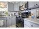 Well-appointed kitchen features updated countertops, stainless steel appliances, and ample cabinet space at 2359 Seattle Slew Dr, Indianapolis, IN 46234