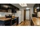 Bright kitchen features stainless steel appliances, wood countertops, and ample cabinet space at 2411 N Willow Way, Indianapolis, IN 46268