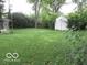 Green backyard with shed at 2610 Marywood Dr, Southport, IN 46227