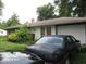 Single-story residence with attached garage and well-maintained landscaping at 2610 Marywood Dr, Southport, IN 46227