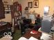 Home office featuring a desk, shelving, and natural light at 2610 Marywood Dr, Southport, IN 46227