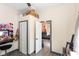 An oddly decorated bedroom with an open doorway to another room at 2702 S Moreland Ave, Indianapolis, IN 46241