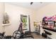 An oddly decorated bedroom with lots of decorations and gym equipment at 2702 S Moreland Ave, Indianapolis, IN 46241