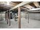 The basement features a concrete floor, exposed ductwork, and block walls ready for your personal touch at 2715 S A St, Elwood, IN 46036