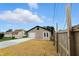 This property includes a detached garage with a concrete driveway and unique patio area and stone veneer at 2715 S A St, Elwood, IN 46036