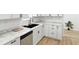 This bright kitchen includes stainless dishwasher, sleek counters and undermount sink at 2715 S A St, Elwood, IN 46036