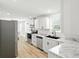 The renovated kitchen offers stainless steel appliances and stylish countertops at 2715 S A St, Elwood, IN 46036