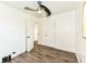 This bedroom features laminate flooring, neutral paint, and a modern ceiling fan at 2724 N Dearborn St, Indianapolis, IN 46218