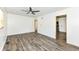 Spacious living room featuring new hardwood floors and modern lighting at 2724 N Dearborn St, Indianapolis, IN 46218
